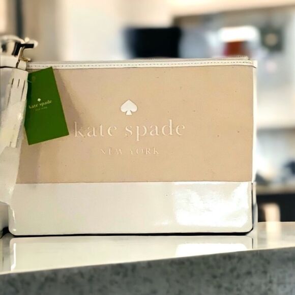 KATE SPADE NWT LARGE TASSEL POUCH ASH ST LOGONATURAL - Picture 1 of 7